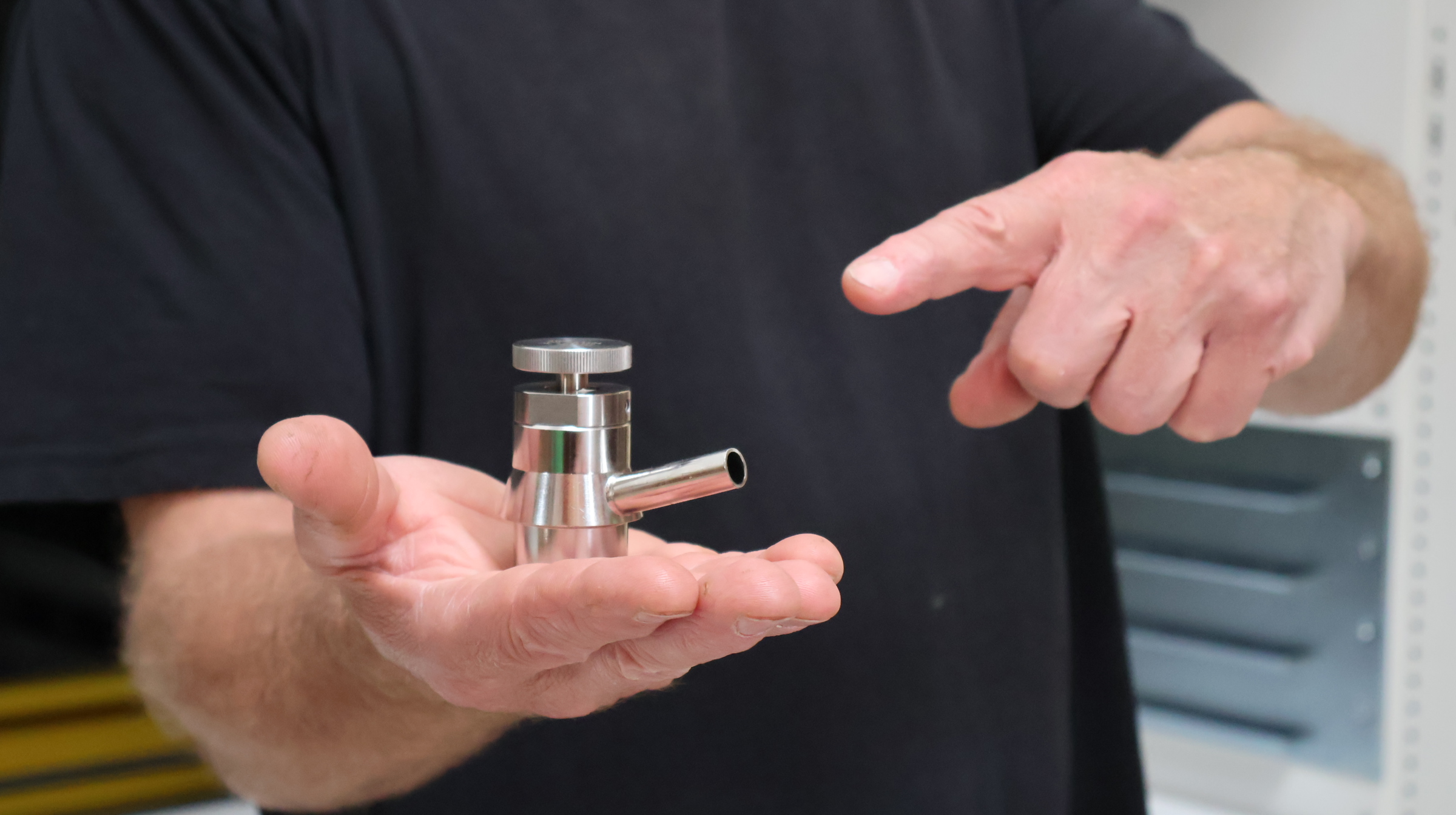 peter holds sampling valve