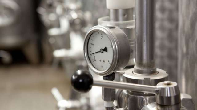 Bar pressure gauge in production plant 