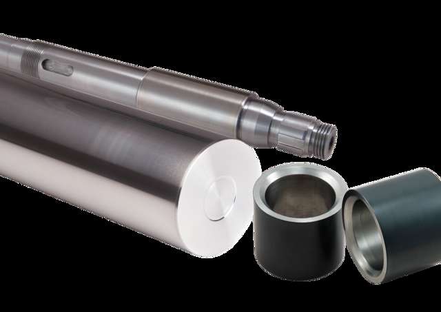 Hard metal plated piston, shaft and bushings