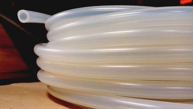 Coiled silicone hose on shelf