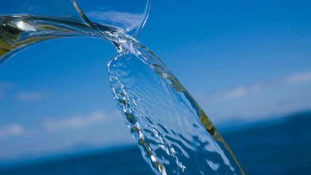 Water being poured out of the jug