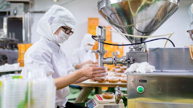 Employee takes sample